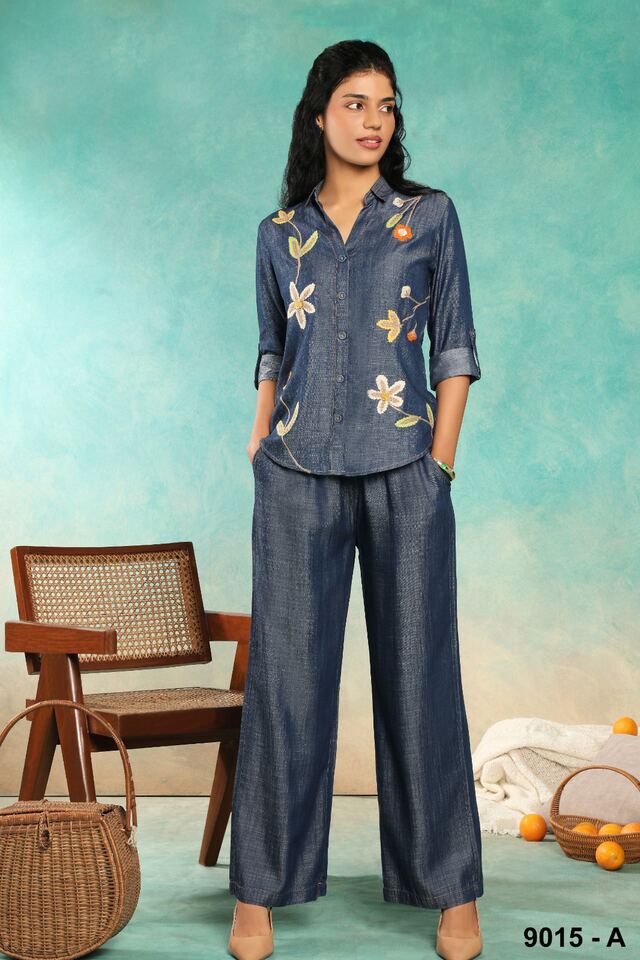 Chambray denim co-ord set with hand-embroidered floral motifs on the shirt