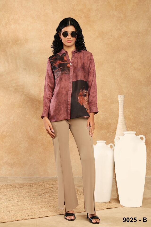 Rose abstract-print shirt with camel trousers and dark sunglasses