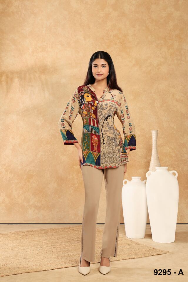 Patchwork-print tunic in ochre and teal with beige trousers