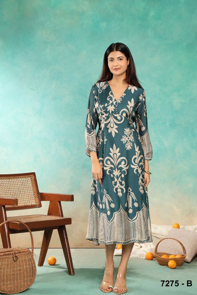 Teal ikat-print midi dress with a bordered hem and long sleeves