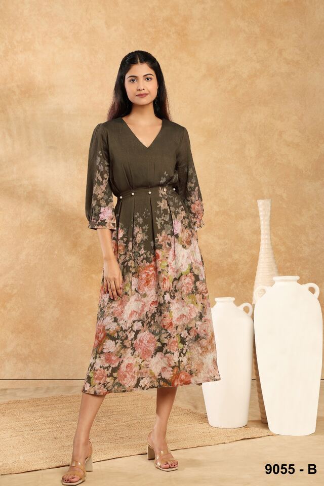 Olive midi dress that dissolves into a soft floral print at the skirt